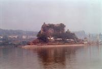 Once a hilltop, this temple is now an island