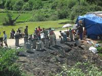 Selling charcoal by the roadside