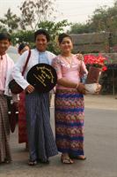 Family and friends dress up for the procession