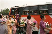 Family and friends dress up for the procession